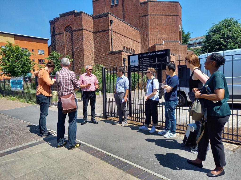 People standing outside a church